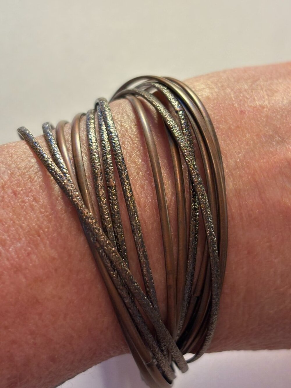 Stack of 15 Interlocking Bronze Tone Bangle Bracelets